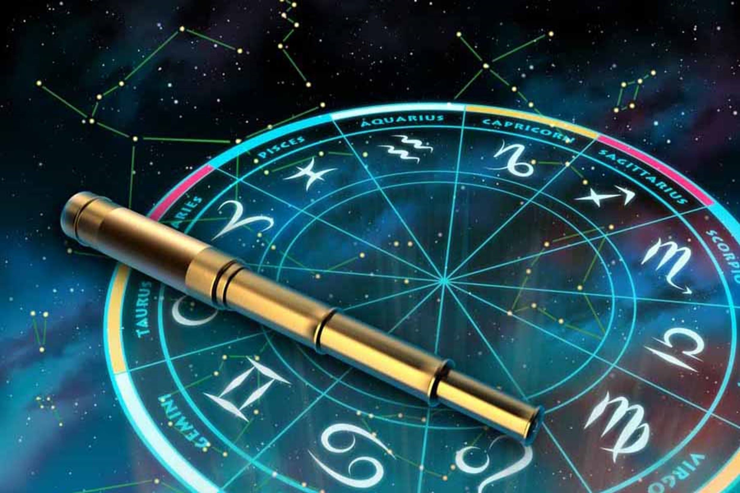 Está la rueda de los signos del zodiaco. De fondo está el universo y sobre la rueda hay un telescopio. 